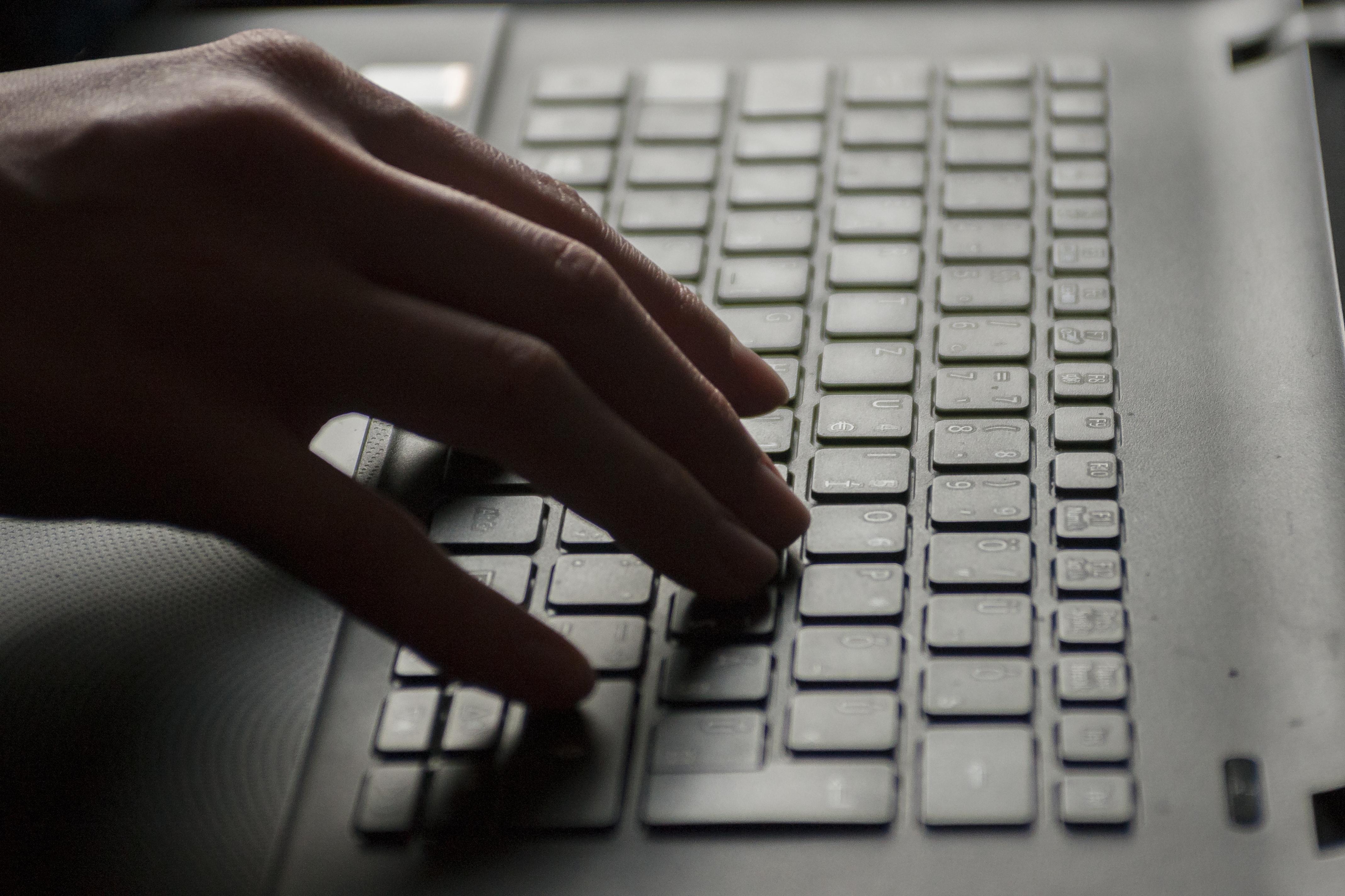 picture of person working on laptop